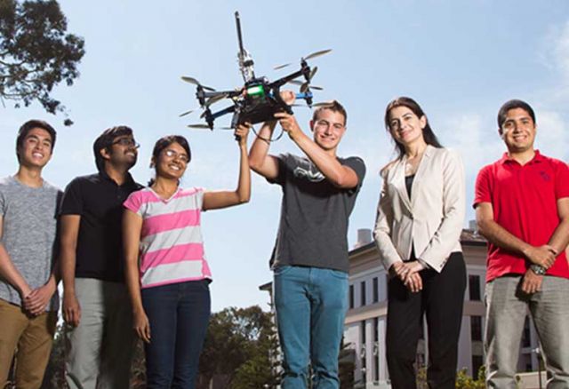 photo of students with their advisor