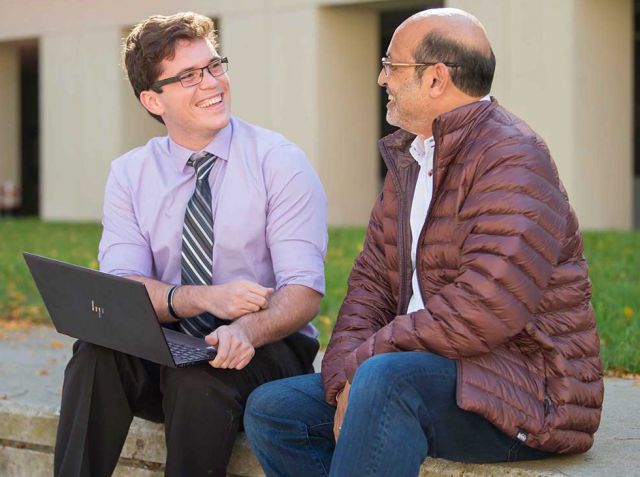 Image of student and Professor Umesh
