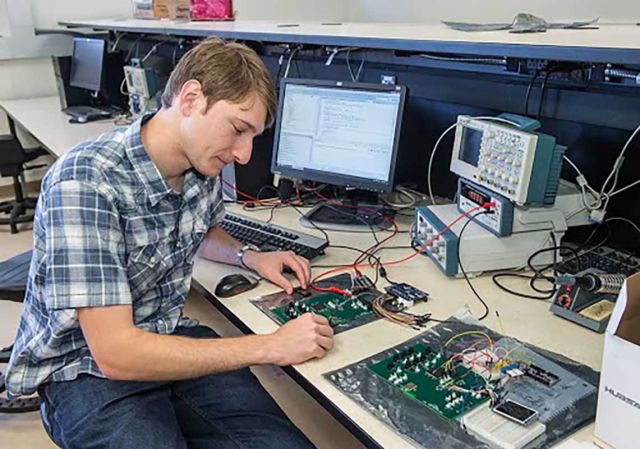 Image of Student working on project