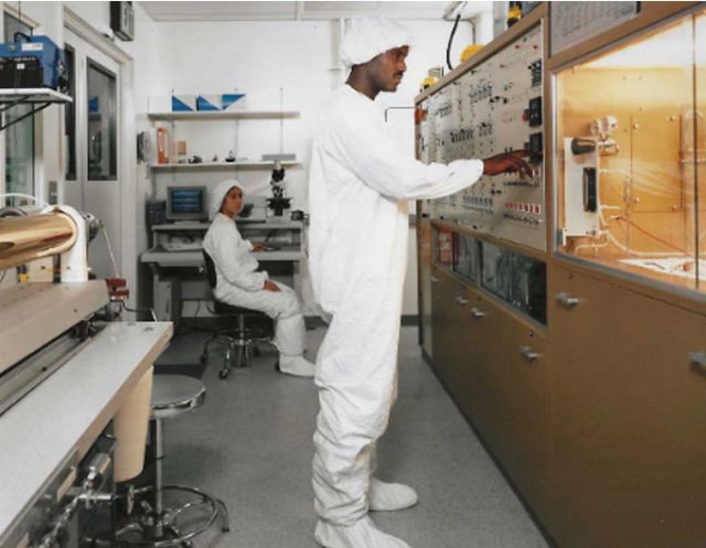 holmes as a graduate student in the cleanroom