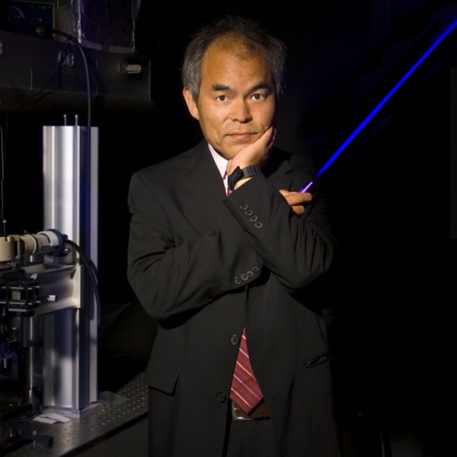 photo of nakamura with blue laser light
