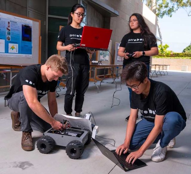 students with their robot project