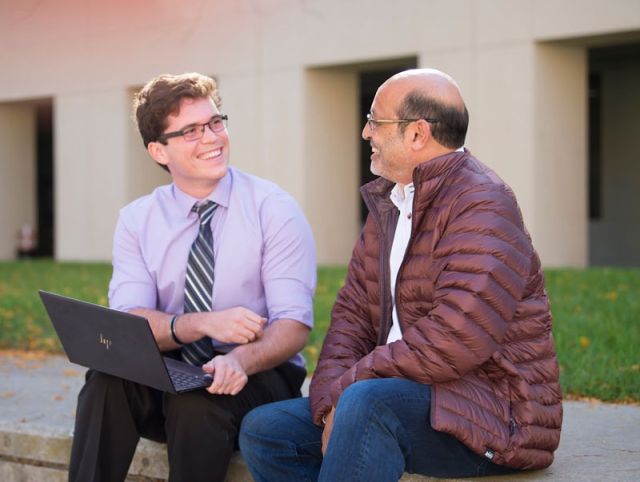 Image of student and Professor Umesh