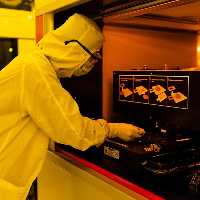 researcher in the lithography bay