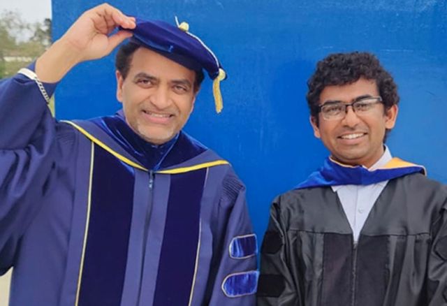 photo of banerjee w/ a student at graduation
