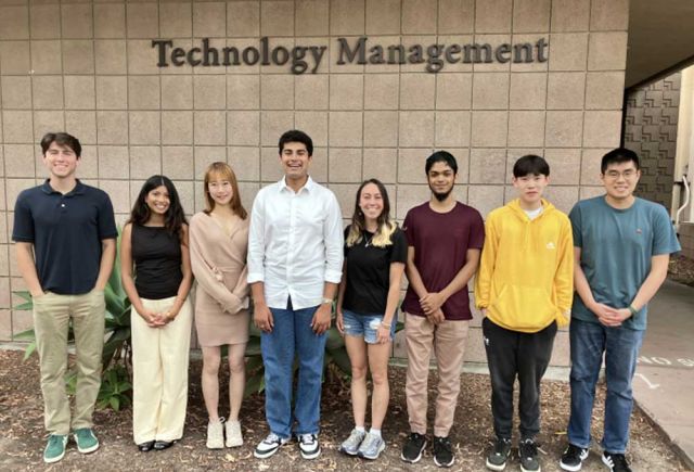 photo of the eight E+TM program fellows