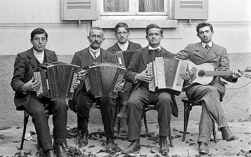 Swiss musicians from the south of the Alps, photographed in the early 1900s