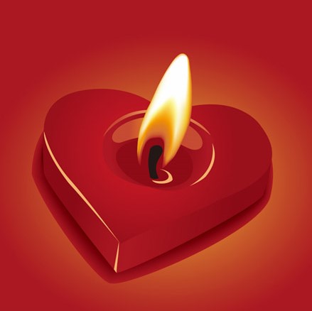 Photo of heart-shaped red candle