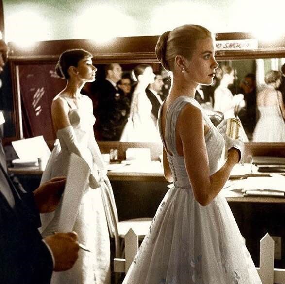 Audrey Hepburn and Grace Kelly, backstage at the 1956 Academy Awards
