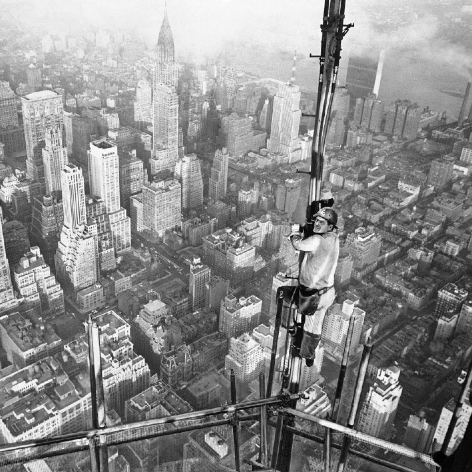Fixing the antenna atop the Empire State Building, 1950