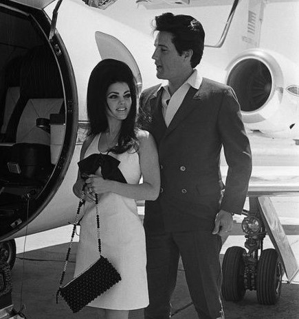 Elvis and Priscilla about to board a chartered plane after their marriage, 1967