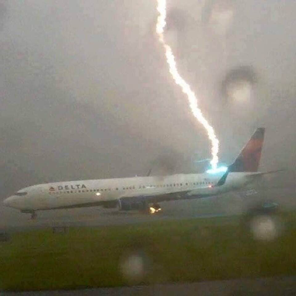 Perfectly-timed photo: Lightning bolt strikes a Delta passenger jet