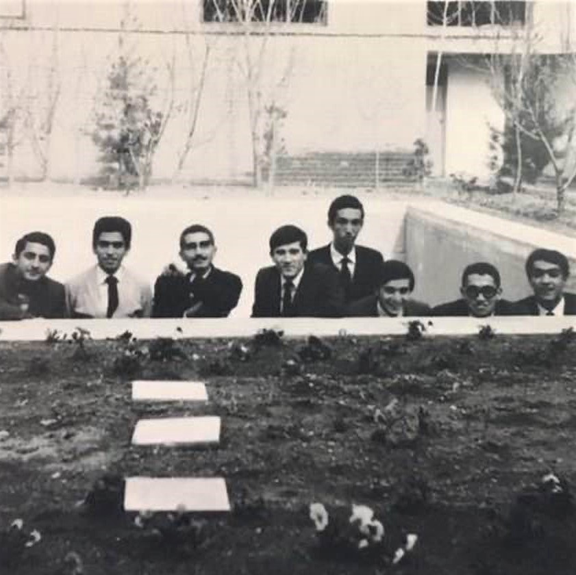 A few college classmates visiting my home in the Vanak neighborhood of Tehran, posing inside our empty pool