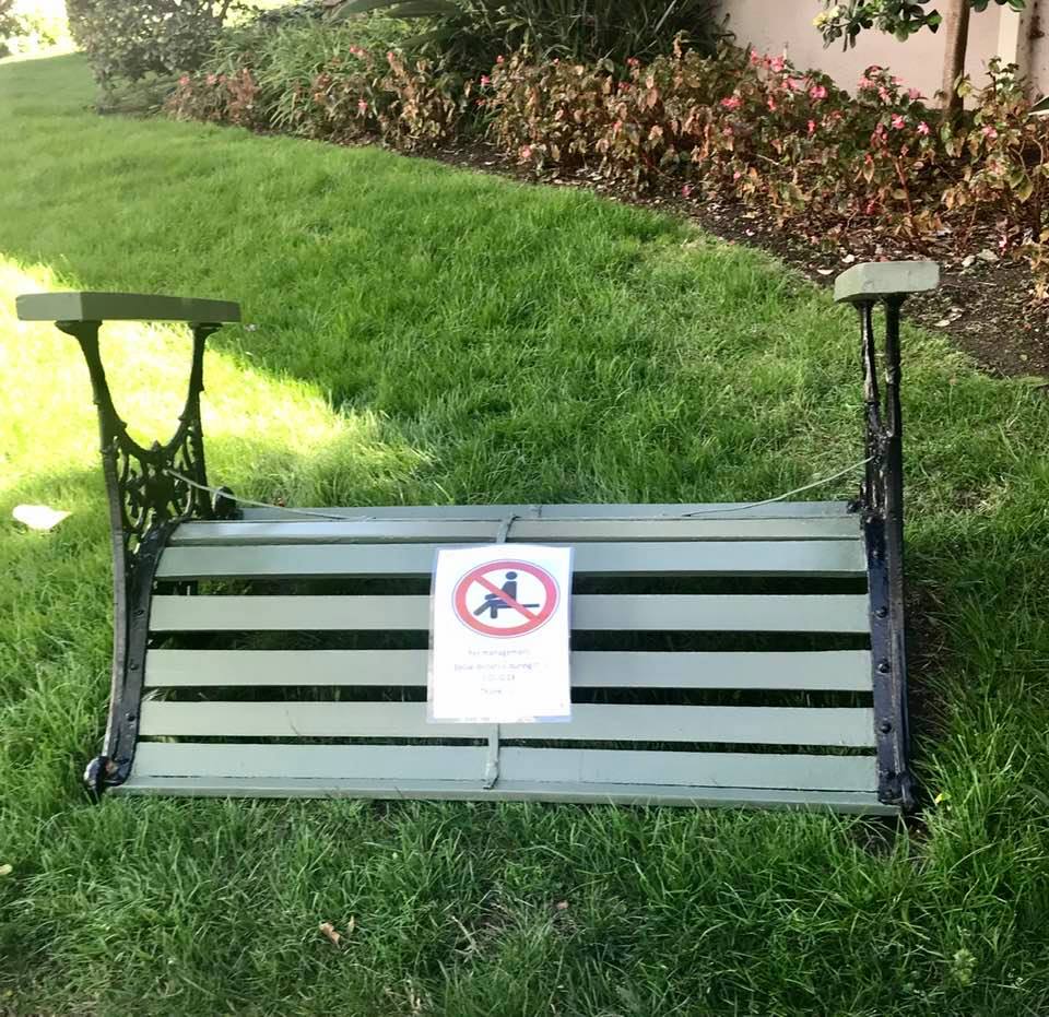 Social distancing: This park bench has been upended to prevent people from sitting on it