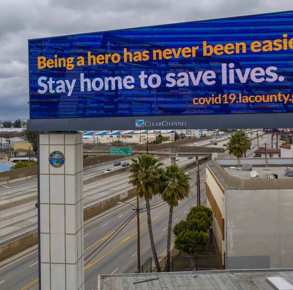 Los Angeles County billboard: Being a hero has never been easier. Stay home to save lives