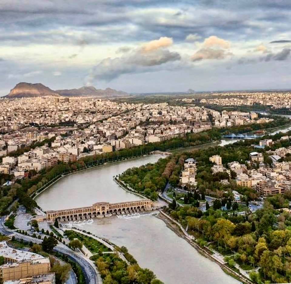 A nice aerial photo of Isfahan, Iran, featuring Zayandeh Rood and one of its historic bridges