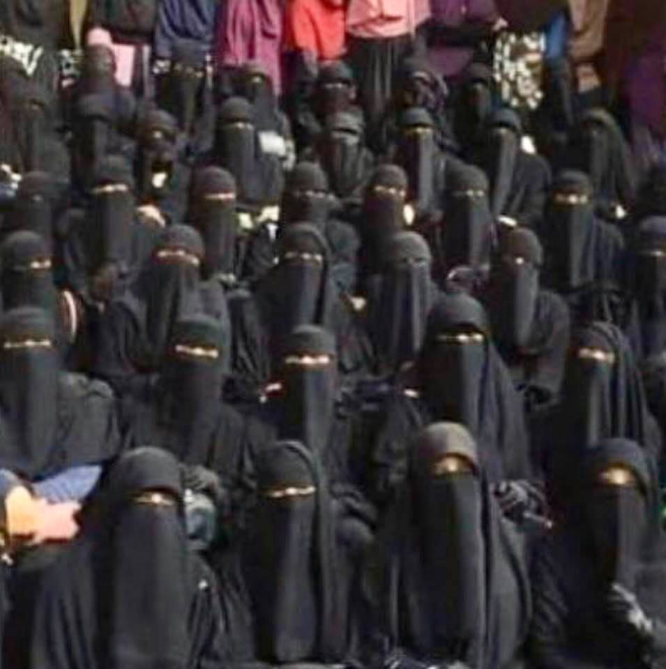 Photo of a group of fully-veiled women