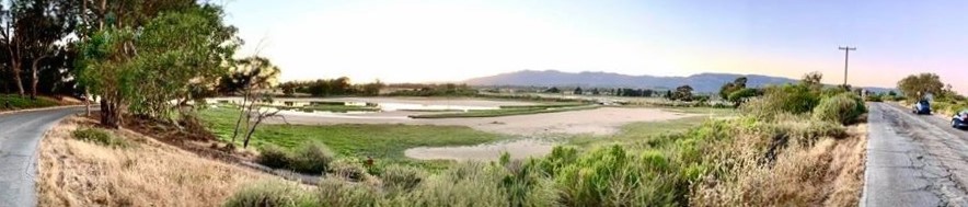 Panoramic view of a nearly-dry Devereux Slough in Goleta, California