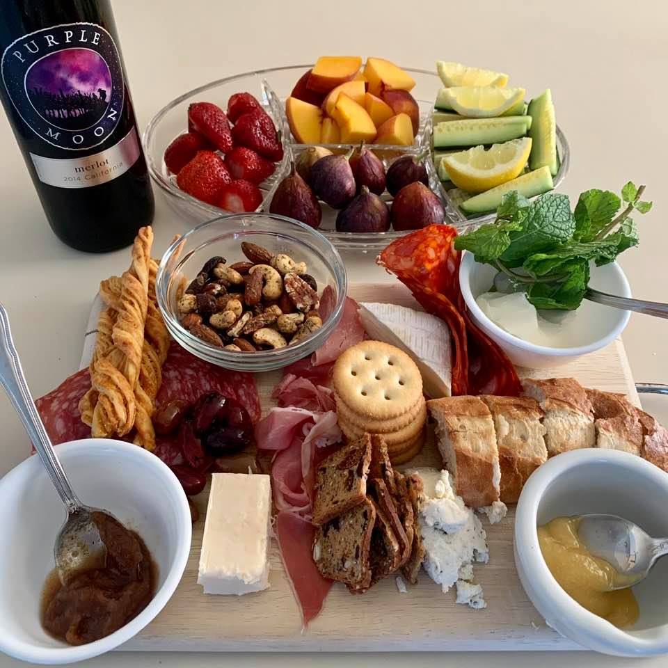 Collaboration: My daughter's cheese/deli tray and my fruit plate