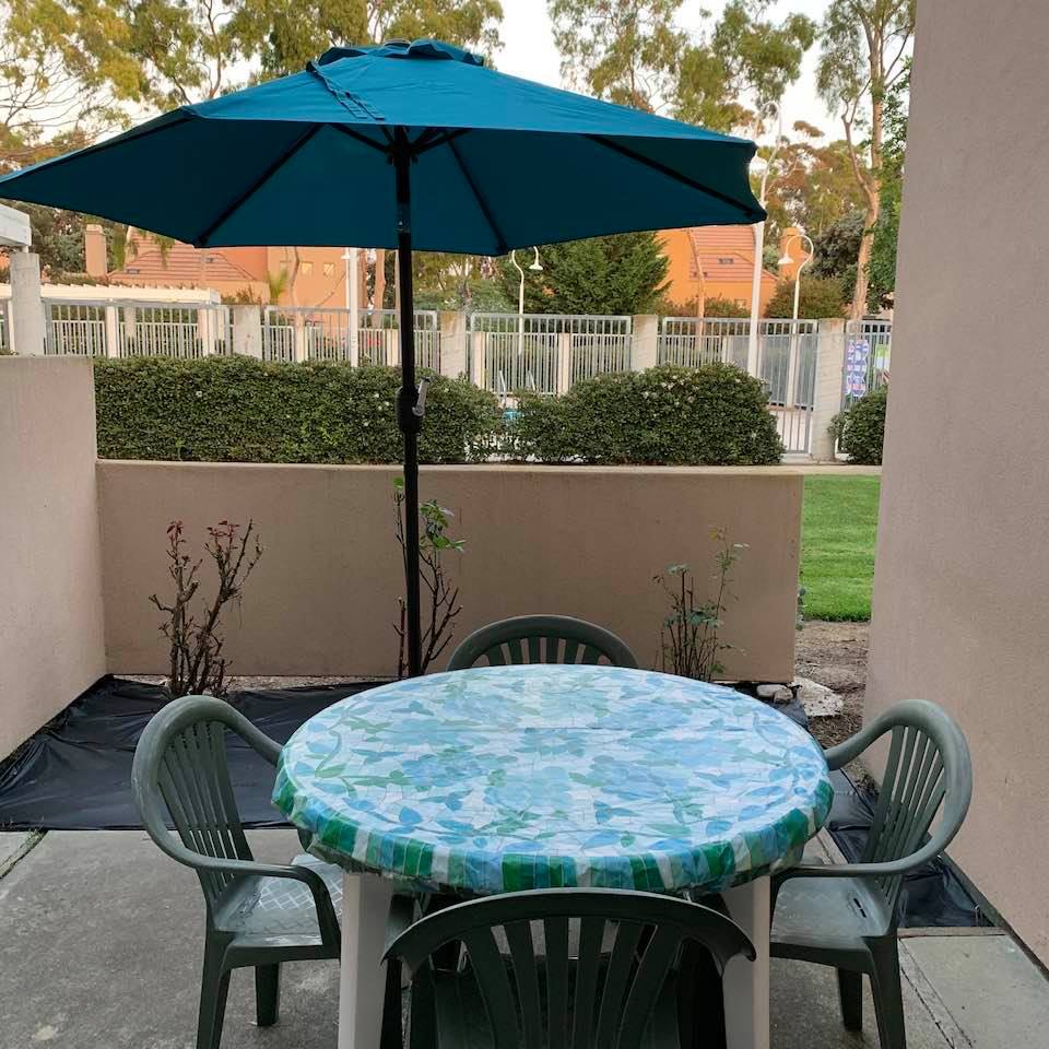 Replacing my beat-up umbrella has brought new color and life to the patio adjacent to my study