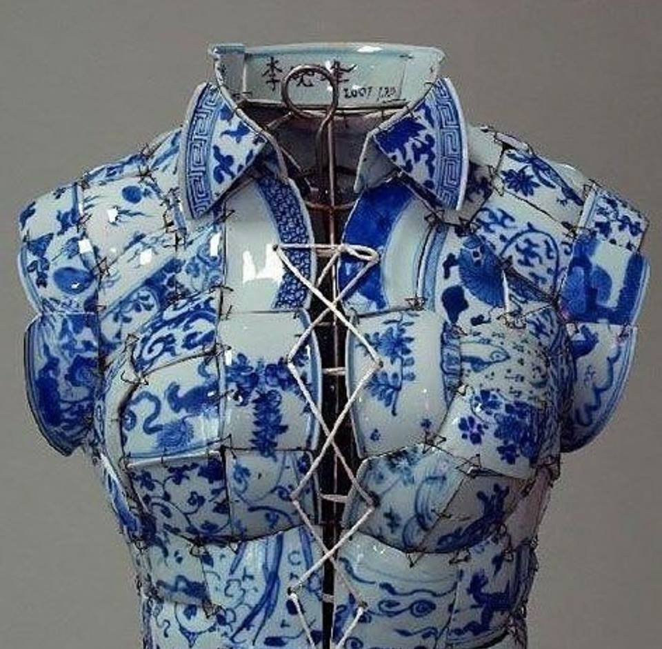 An extraordinary piece of art, perhaps made from broken-off pieces of china, stitched together