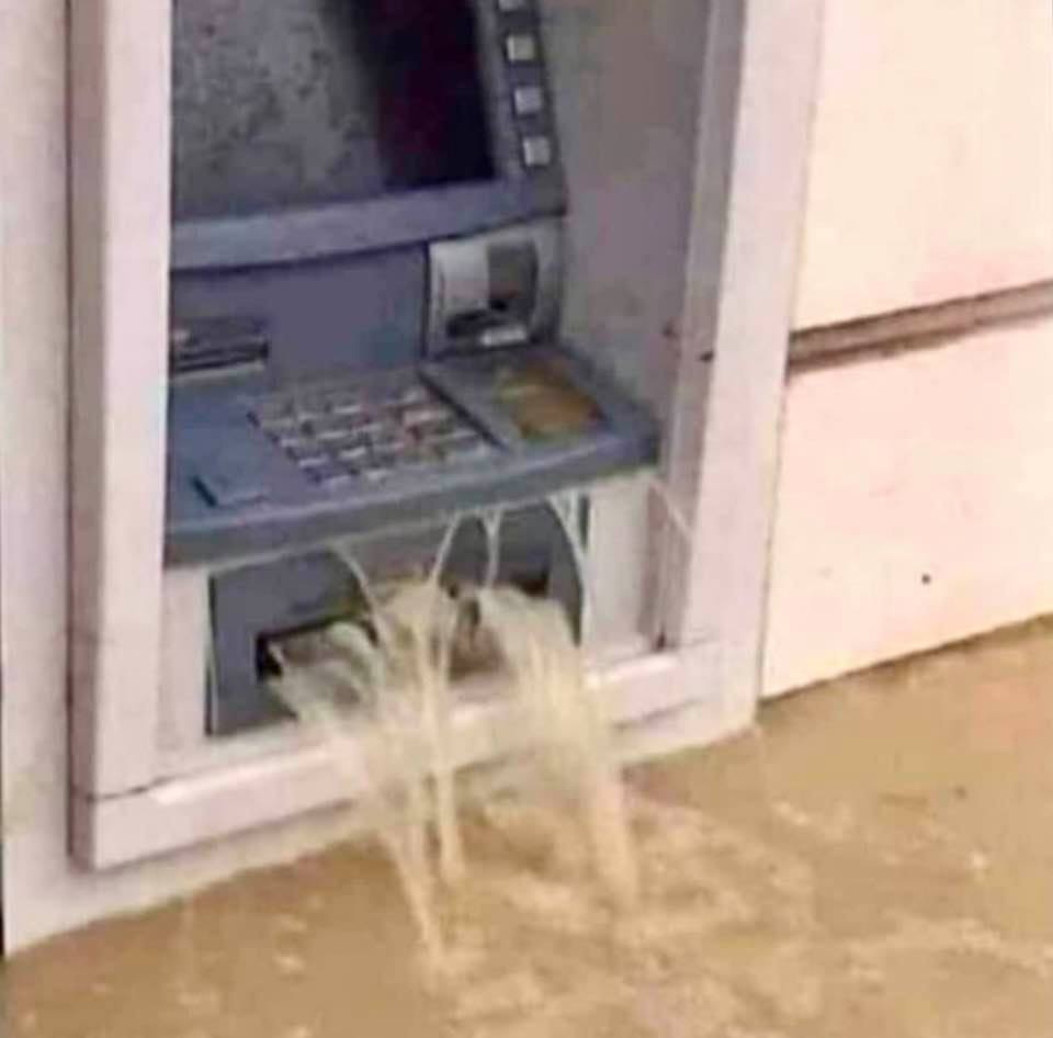Money-laundering for real: A bank in Ahvaz, Iran, after recent floods!