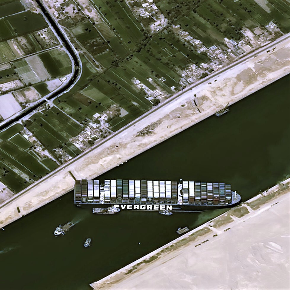 Photo showing the Suez Canal blocked by a container-ship stuck across it