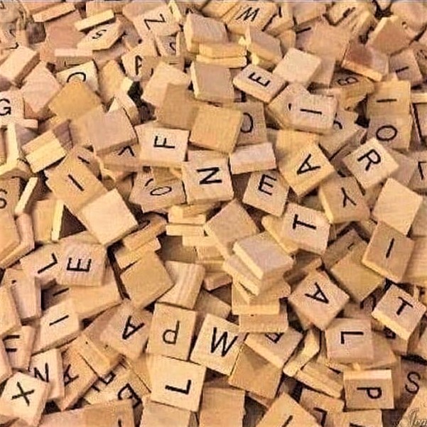 I am excited about the book I bought from Ikea! (A large pile of Scrabble tiles)