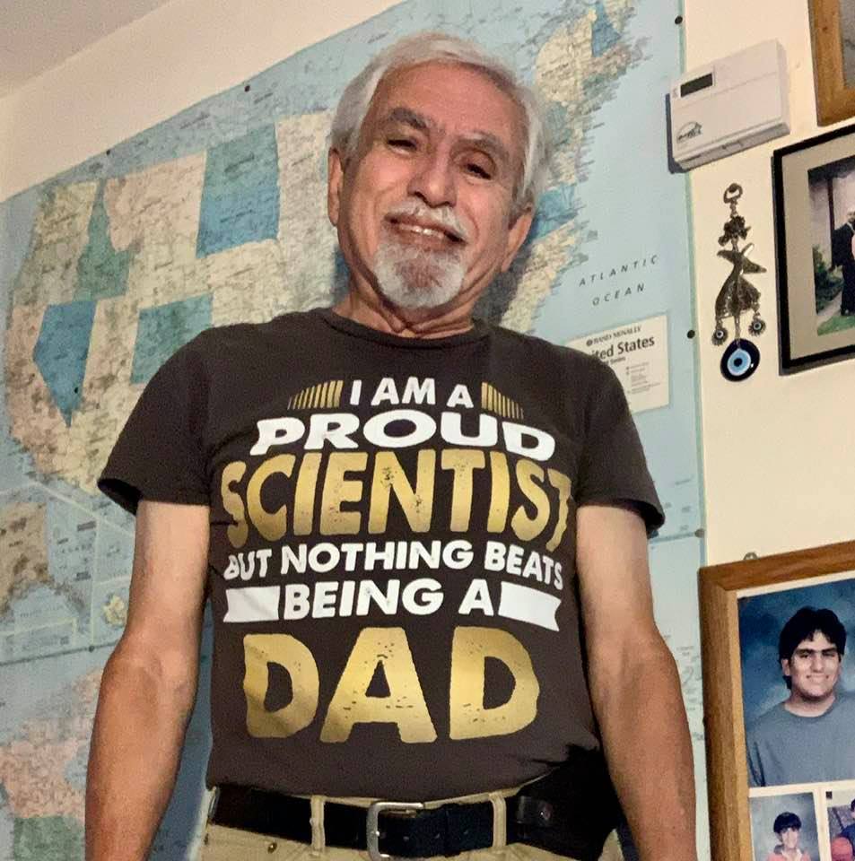 Wearing my T-shirt: Pround scientist, but prouder dad!
