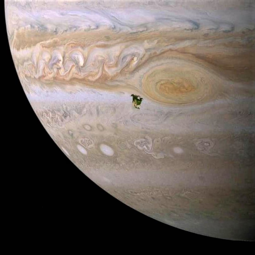 The tiny green blot is North America on Jupiter