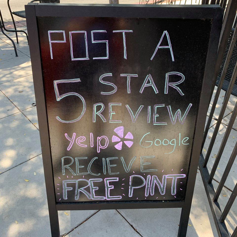 Lao Wang restaurant in Isla Vista openly advertises a bribe for 5-star reviews