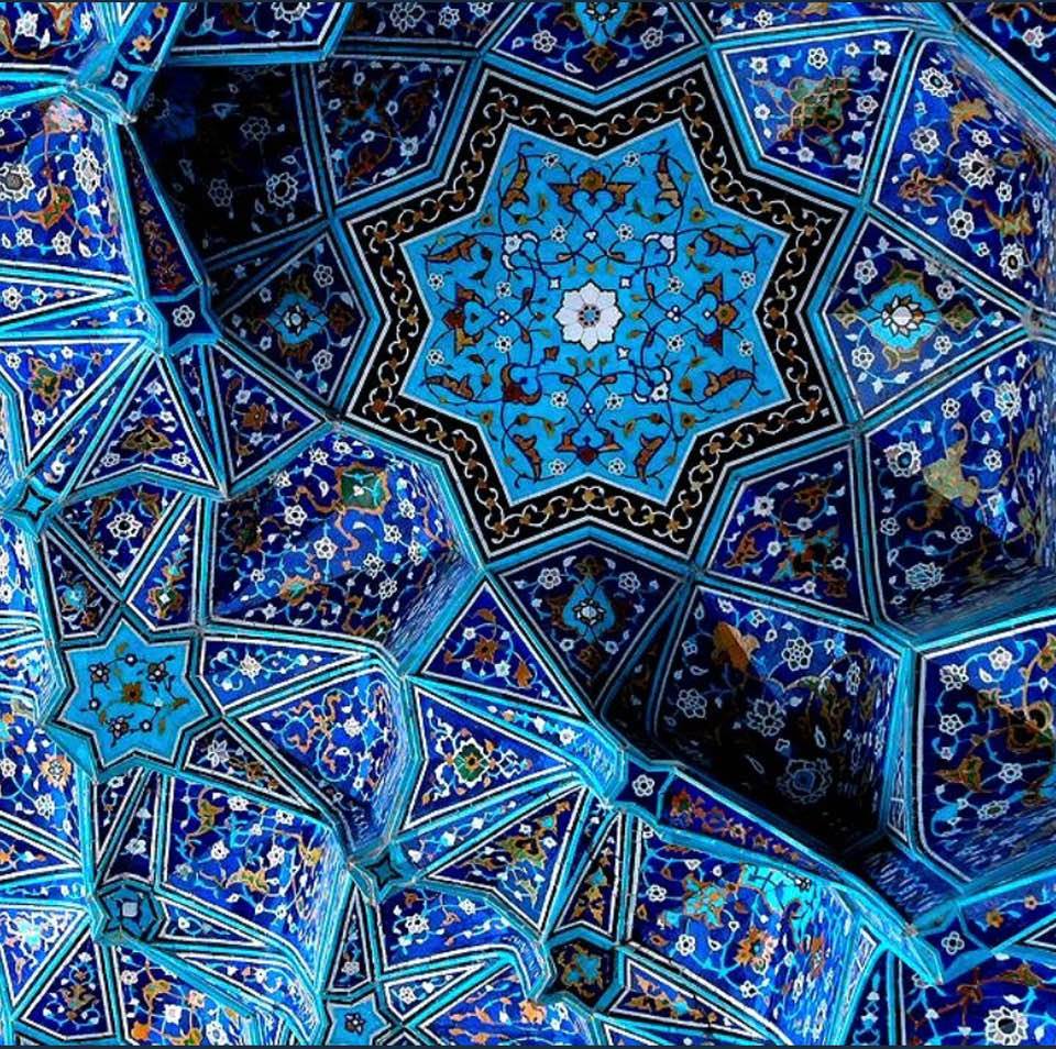 The beauty of symmetrical designs and color schemes in Iranian architectural tilings: Photo #2