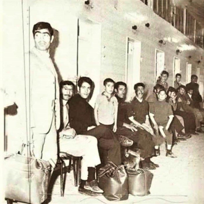History in pictures: Customers waiting for their turn to use a shower stall, in an Iranian public bath-house of 5 decades ago