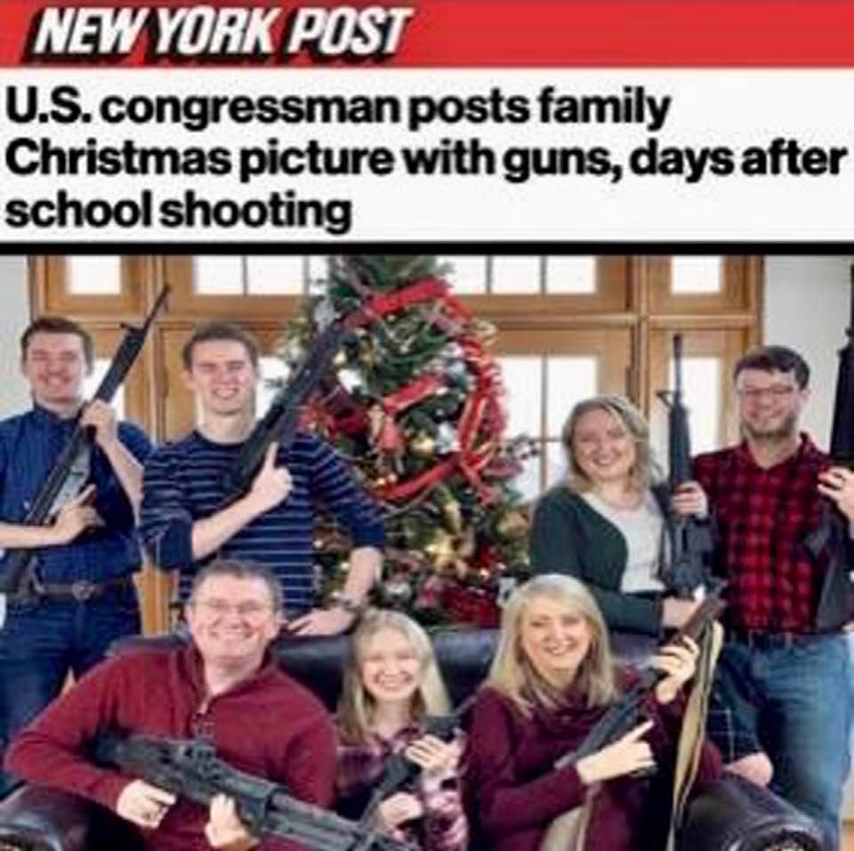 Family photo posted by a US congressman: Nothing says Christmas cheer more than assault rifles!