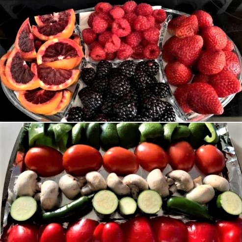 Colors of nature: Berry-themed fruit plate (including raspberry blood oranges) and a veggie tray ready to go into the broiler