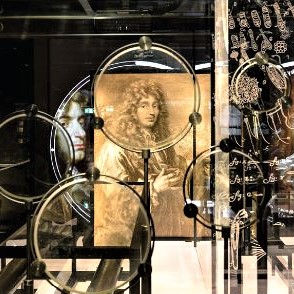 Portrait of astronomer Christiaan Huygens at a science museum in Leiden, seen through original lenses he designed for his telescopes