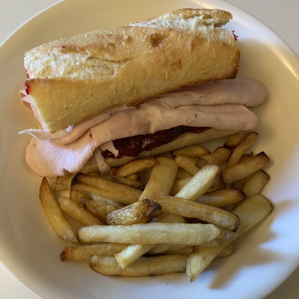 Turkey sandwich with cranberry sauce for early dinner
